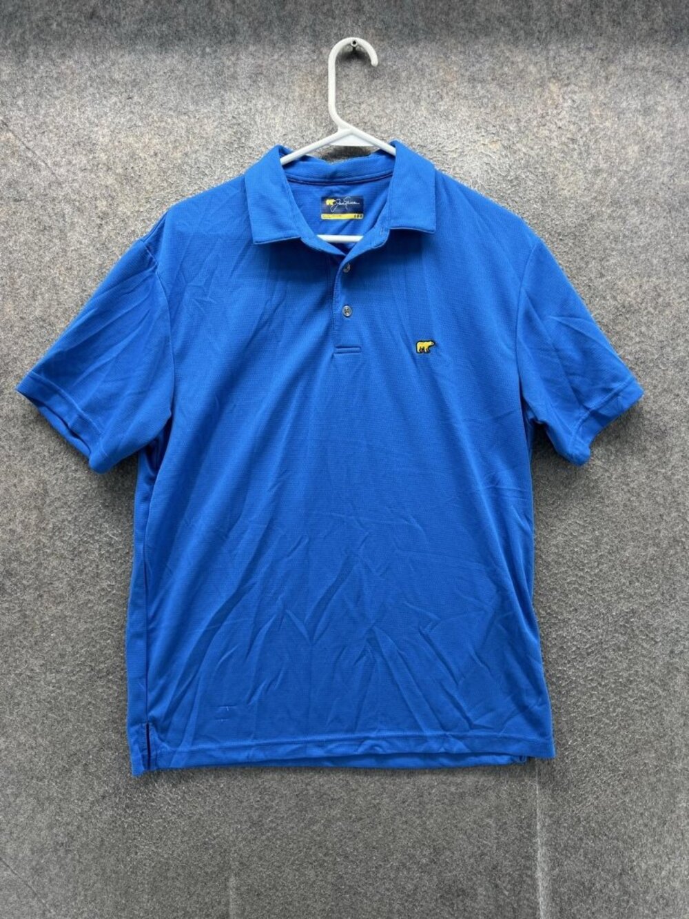 Jack Nicklaus Polo Shirt Men Medium Blue Solid Golf Performance Knit Casual Logo